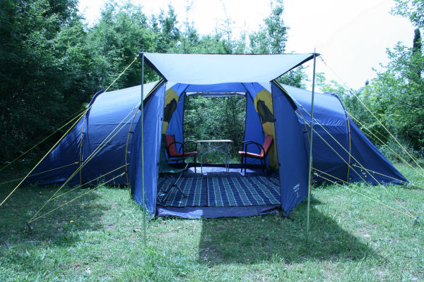 Mimosa Mansion - €25 per person per nightTwo roomed 4-6 person tent with central head height seating space. Two canopy porch openings. curtained windows, storage pockets. Sprung or luxury inflatable mattresses, bedding and towels included.